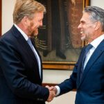 Dutch king swears in a new government 7 months after elections