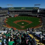 Fans throw objects, storm field during final A’s game in Oakland