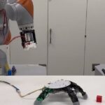 This robot arm can detach its hand to grab things out of reach