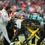 Dolphins’ Grant DuBose needs jersey cut off, leaves game on stretcher after scary hit vs Texans