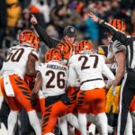 Bengals defense steps up to keep slim playoff chances alive in season finale