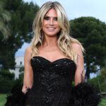 Heidi Klum turns heads in bikini top at Calzedonia billboard unveiling