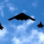 B-2 stealth bombers possibly carrying bunker-busters appear to head toward Guam