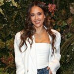 Jessica Alba lounges poolside in bikini while promoting friendship and self-care