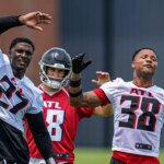 Falcons players fight during training camp practice
