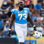 Chargers’ Mekhi Becton falls ill in Brazil, issues food warning