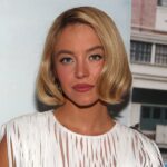 Sydney Sweeney climbs Hollywood sign for lingerie brand promotional stunt