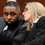 Ex-Michigan coach scores legal win in criminal case