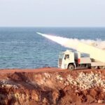 Iran fires missiles into Strait of Hormuz during military naval drills