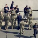 US men’s hockey team shares medal moment with military before White House visit
