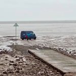 Amazon delivery driver rescued after GPS sends van onto UK mudflats