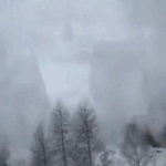 Tourist films terrifying moment avalanche slams into packed passenger train